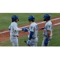 Tulsa Drillers congratulate Jake Gelof after a homer