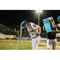 Biloxi Shuckers shortstop Dylan O'Rae gets a shower