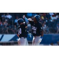 Josue De Paula of the Tulsa Drillers celebrates after his two-run homer