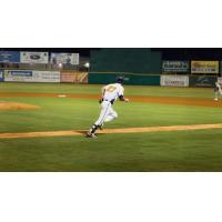 Down East Bird Dawgs utility player Christian Adams heads to first