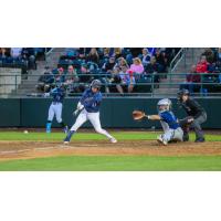 Tri-City Dust Devils shortstop Johan Macias at bat