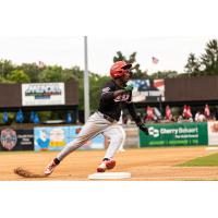 Austin Davis of the Sioux City Explorers rounds third base