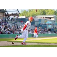 Noah Marcelo of the Winnipeg Goldeyes heads to first