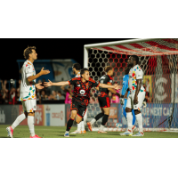 Phoenix Rising and Oakland Roots SC on game night