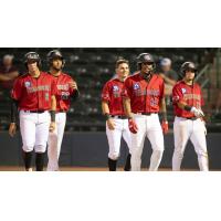 Hickory Crawdads a happy bunch walking off the field