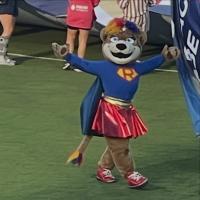 North Carolina Courage mascot Roary in superhero attire