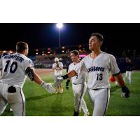 Pensacola Blue Wahoos outfielder Fenwick Trimble (right)