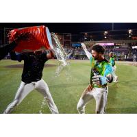 Cristian Hernández gets the Gatorade treatment from the Pensacola Blue Wahoos