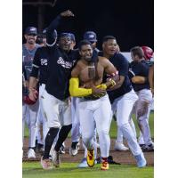 Sioux City Explorers' Braulio Vasquez celebrates win with team