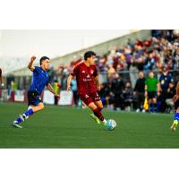 Detroit City FC midfielder Maxi Rodriguez with possession