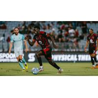 Phoenix Rising's Dominique Badji in action