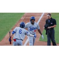 Josue De Paula of the Tulsa Drillers crosses home plate after homering
