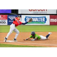 Lincoln Saltdogs third baseman Calyn Halvorson fields a throw