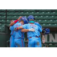 Ogden Raptors congratulate Hank Dodson after his grand slam