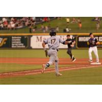 Charleston RiverDogs catcher J.D. Gonzalez runs to first