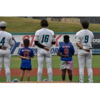 Mississippi Mud Monsters stand for the National Anthem