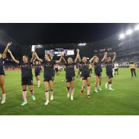 Angel City Football Club celebrates their win over Seattle Reign FC